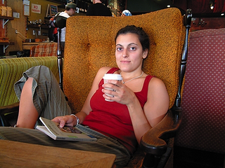 Davis relaxes at a coffee shop while Tibetans suffer under the rule of the Chinese.